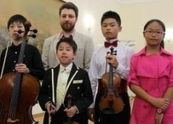 Выпускник музыкальной школы в Таганроге пригласил юных музыкантов из Китая