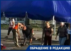 «Неужели нельзя сделать с первого раза?»: как меняют асфальт в районе рынка