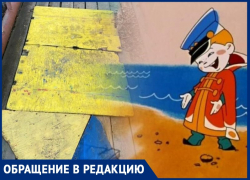 «И так сойдет» - кусок фанеры прибили и так «Благоустройство» Таганрога починили мост